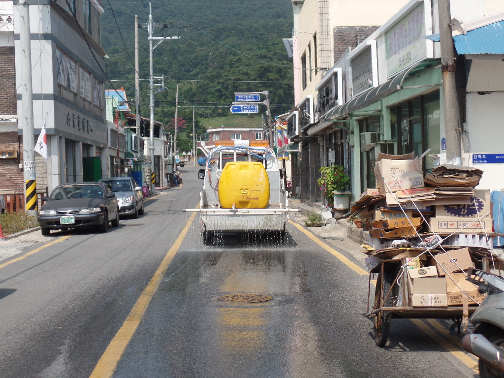 한산면, 찜통 더위에 ‘도로 샤워’